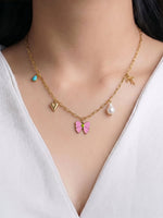Maribel Bow Pearl Charms Necklace